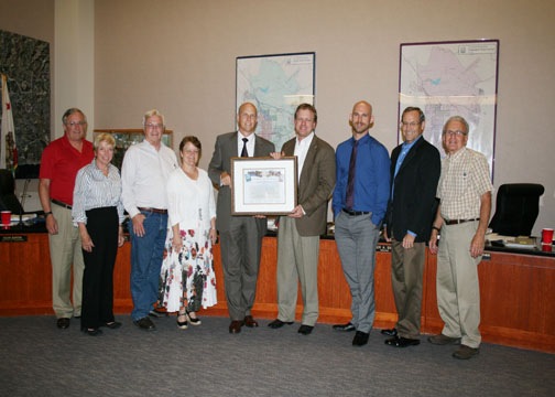 From left, IRWD Board members John Withers, Mary Aileen Matheis, and Peer Swan; Janet Yamaguchi of Discovery Science Center; IRWD Interim General Manager Paul Cook; Discovery Science Center President Joe Adams; Toby Gant of Discovery Science Center; IRWD Board President Steve LaMar and IRWD Board Member Doug Reinhart.